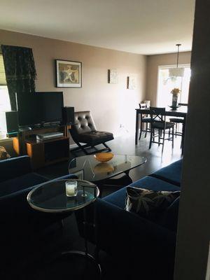 A bit of a darker photo but I like the rich feel of my Modern furniture against this flooring.