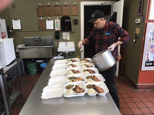 Our chef preparing meals for home bound people during the recent pandemic.