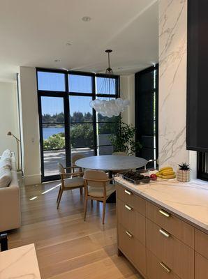 Clean kitchen nook ,table,dusted chairs and clean floors!