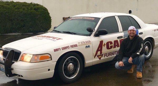 The A+ Carpet Cleaning dirty carpet patrol car.