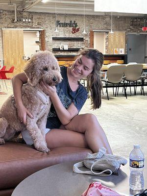 Lacey, the owner of the bakery, with her dog Sonny'