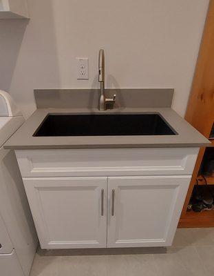 laundry sink vanity quartz counter and backsplash