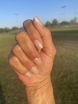 Wonderfully done French neutral nail with a little SPARKLE