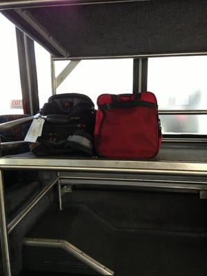 My stuff...resting in comfort on the MasterPark "B" shuttle to SeaTac. airport...!