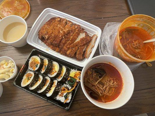 Spicy pork kimbap, spicy shredded beef soup, and pork cutlet