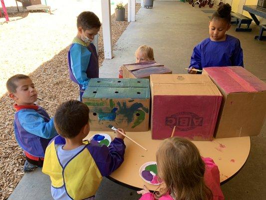 Summer camp included a build it week.  These school aged and CPK graduates were going to build a fort with their painted boxes.