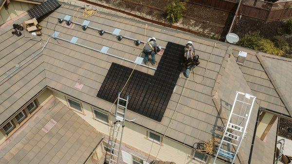 Aerial view of a residential rooftop install.