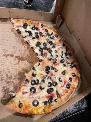 Medium cheese pizza with olives, onions and pineapple