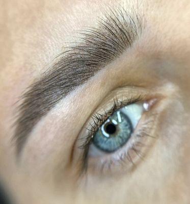 Permanent eyebrow makeup.  Shape and color like the client want.