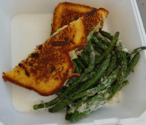 Gourmet grilled cheese sandwich with a side of green bean fries