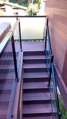 Privacy wall, deck, stairs, and glass railings by Jeremy at Elite Bay Area.