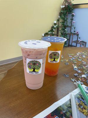 Rose boba tea and the jasmine orange boba tea on the puzzle table!