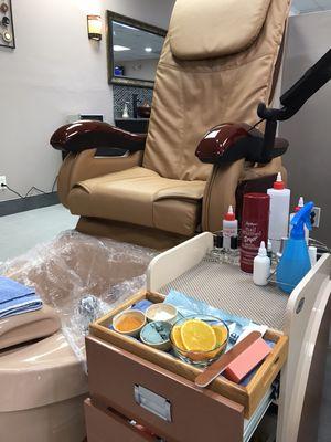 Special holiday pedicure with liner for sanitary and fresh orange scrubs