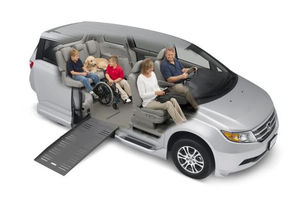 Our wheelchair accessible vans have multiple seating options for the wheelchair user, family and fido.