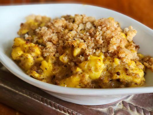 Baked sausage, egg, and cheddar mornay sauce scramble.