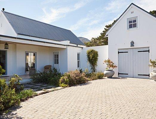 Home with a residential driveway built by M & D Design & Build