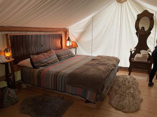 Glamping tent heated bed and provided towels and shampoo/conditioner