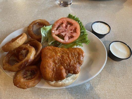 Fried chicken sandwich (Buffalo), onion rings and ranch