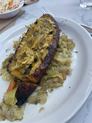 Stuffed plantain w/curry chicken, collard greens and cabbage