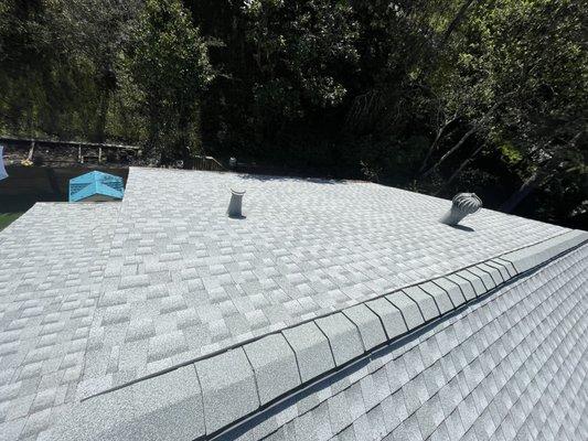 Roof installed in 2023 using Birchwood shingles to help keep home cool in the summer weather