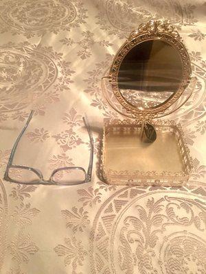 My reading glasses are almost bigger than the vanity tray.