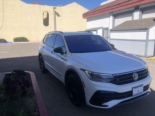 This SUV has UltrVision Film on it's front windshield. That is why it has a Blueish shade on it. UltraVision carries a variety of colors.