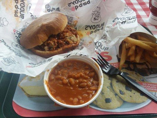 Bbq pork sandwich, baked beans, and fries