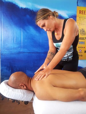 Francesca massaging Kelly Slater