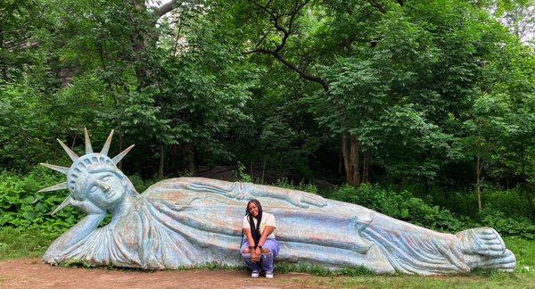 Lounging Statue of Liberty on 125th + Morningside entrance