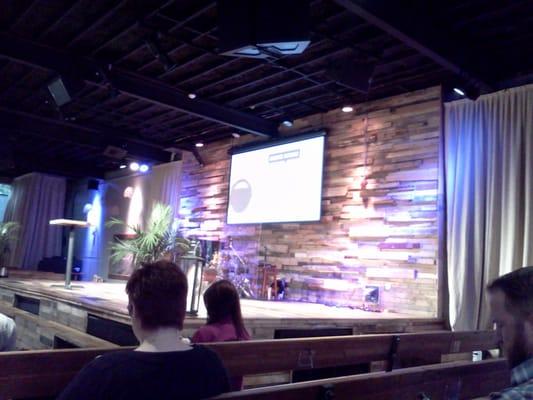 The front stage of Grace Midtown where sermons (or presentations are given).