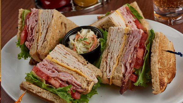 Club Sandwich. Myron's Delicatessen® doles out an extra helping of New York culture complete with humor, artwork, and music a...