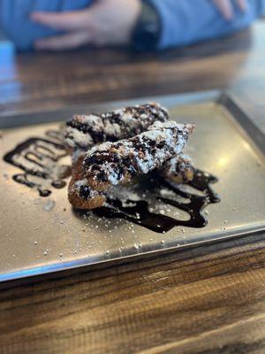 Bread pudding...in the form of a fried stick .  This IS the South ‍.