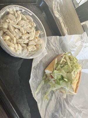 Macaroni salad and half Turkey sub w/cheese