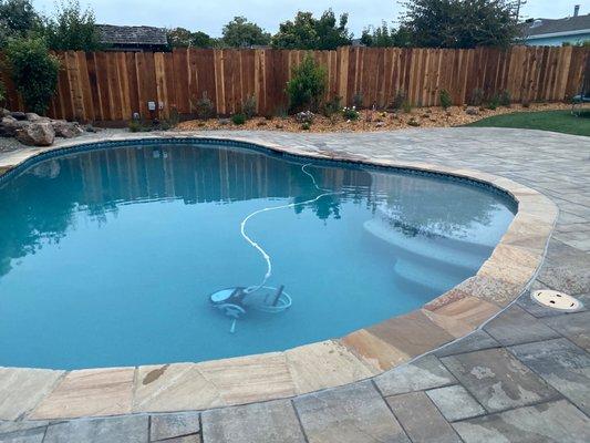 Gorgeous hard scraping around the pool (ignore the vacuum).