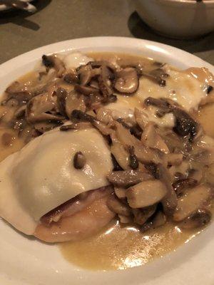 Chicken Saltinbucca (sp?) over sautéed spinach with mushrooms in Marsala wine sauce.