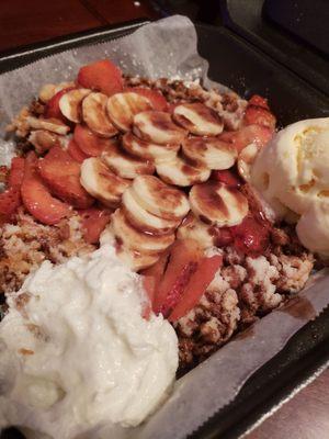 Loaded funnel cake, w strawbs/bananas, chocolate, whipped cream and ice cream.