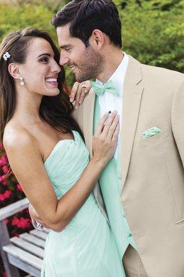 Light color suits and tuxedos and lots of tie and vests options!