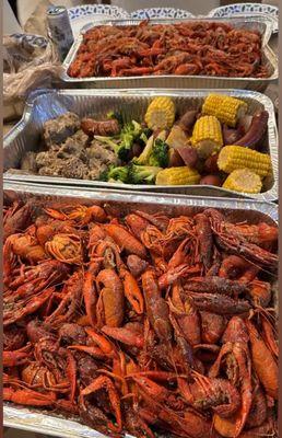 Cooked crawfish ($8.99/lb), turkey necks, broccoli, sausage, potatoes and corn