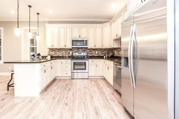 Pearl White Glaze Cabinets.