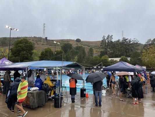 Swim! One of the few sports where rain doesn't mean you get to stay home in a nice warm house. Yay!