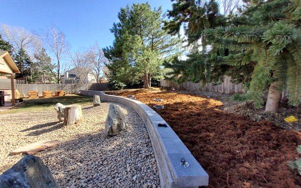 Raised beds, retaining wall, hardscaping and landscaping