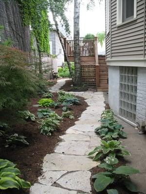 The new walk to the backyard.  Elegant and welcoming!