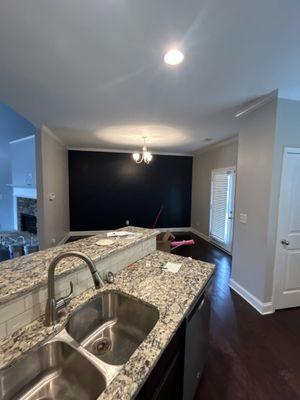 Dinning room/kitchen with accent wall