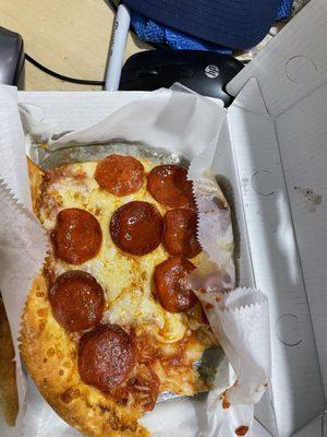 Pepperoni pizza slice