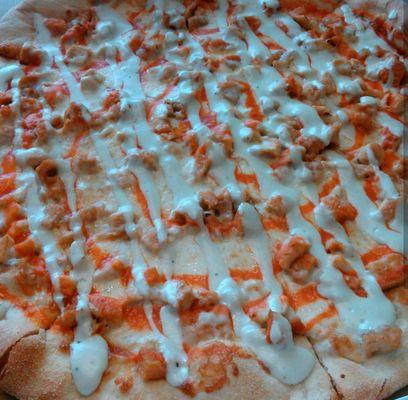 Old picture of the buffalo chicken pizza. They don't do breading anymore, the grilled chicken is not good with this combo.