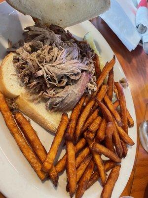 Pulled pork sandwich but subbed brioche for sourdough. Sweet potato fries.