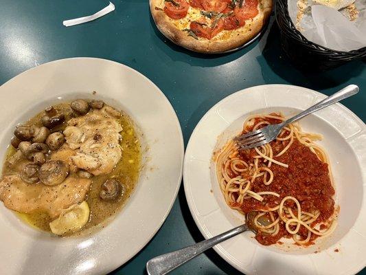 The meat sauce on the pasta side is perfect- meaty, and tangy. Not really sausage-y.  But that Marsala sauce? Best I've ever had. BY FAR.