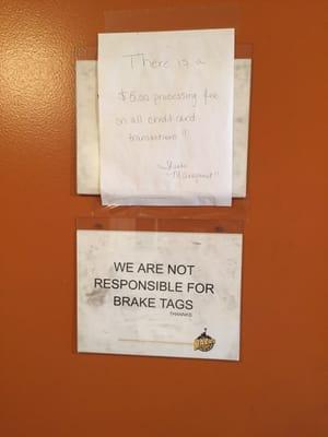 Warning Signs:  #1-$5.00 Charge if using a credit card.   #2. They are Not responsible for the break tag on your windshield.