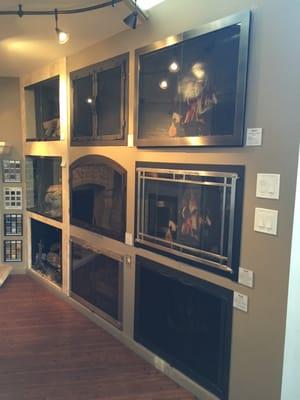 Over 25 fireplace glass doors on display. Most are custom so virtually anything is possible!