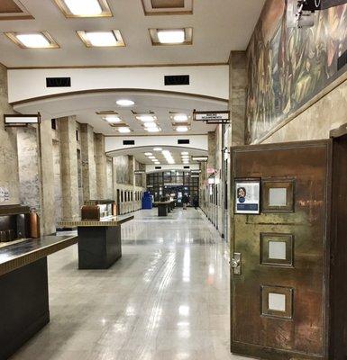 The long interior lobby. Service windows are closed but a postal station still exists in a small room at the far end.